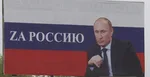 Na ilustračnej snímke billboard s portrétom Vladimira Putina a nápisom Za Rusko v Groznom. Foto: tsasr/ap