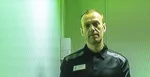 Ruský opozičný líder Alexej Navaľnyj na TV obrazovke počas videolinku z väznice na súde v meste Kovrov.